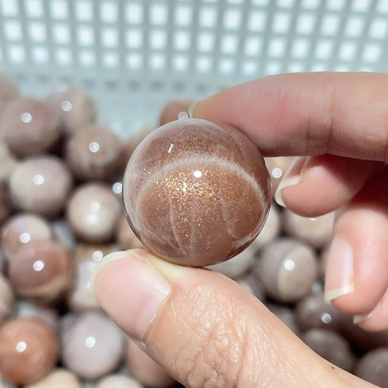 0.8 - 1.1in Beautiful Spark Sunstone Spheres Wholesale - Wholesale Crystals