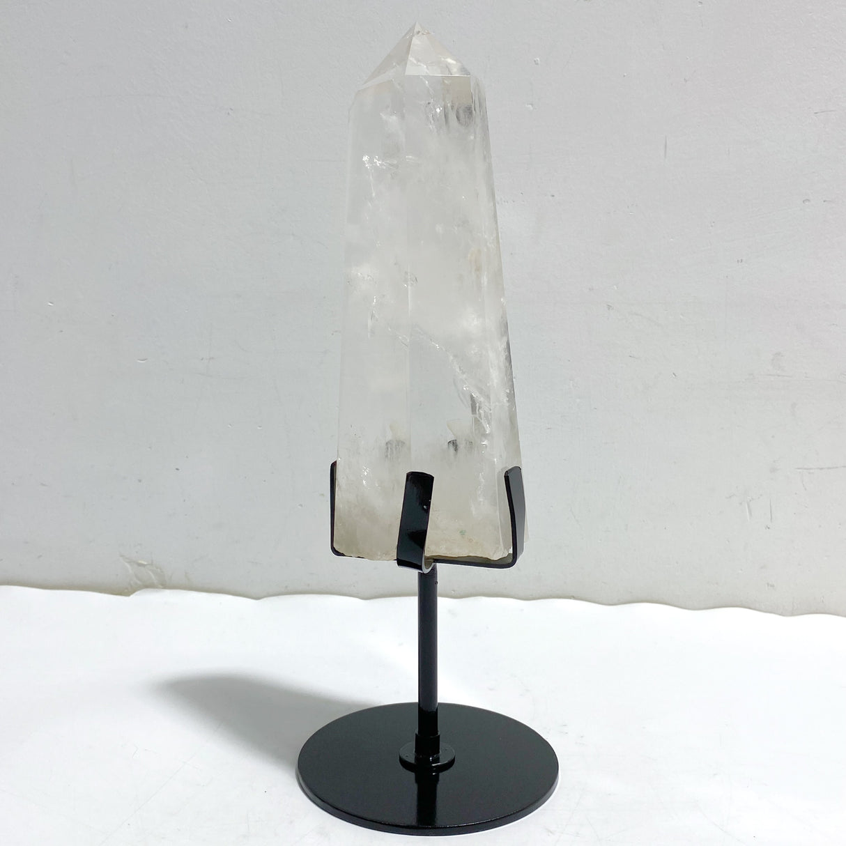 Large Clear Quartz Point Raw Bottom With Stand
