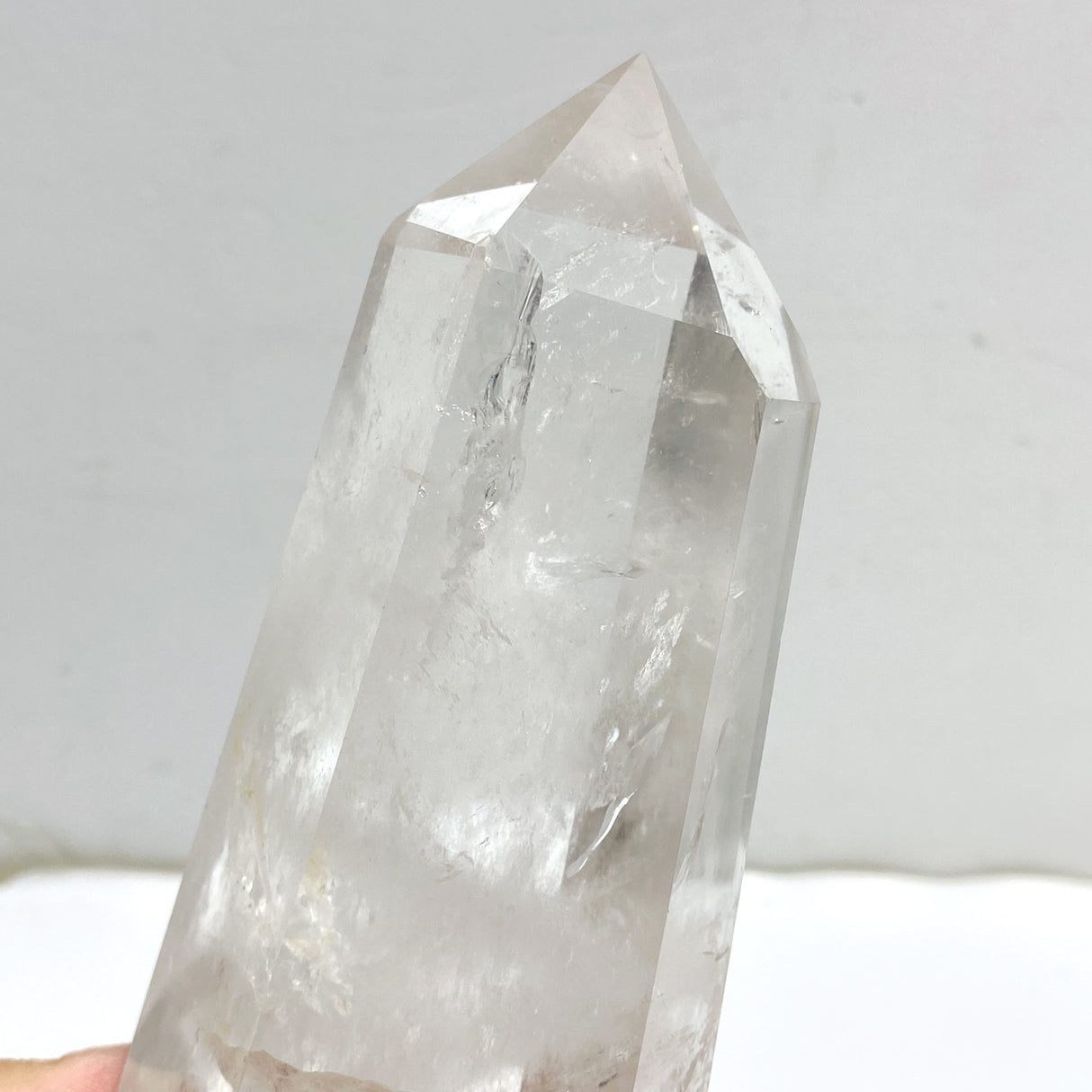 Large Clear Quartz Point Raw Bottom With Stand