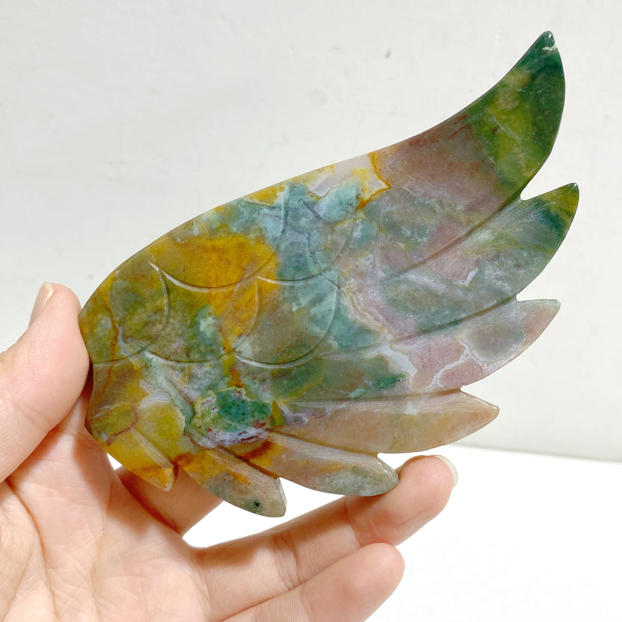 Ocean Jasper Heart Wing Carving With Stand