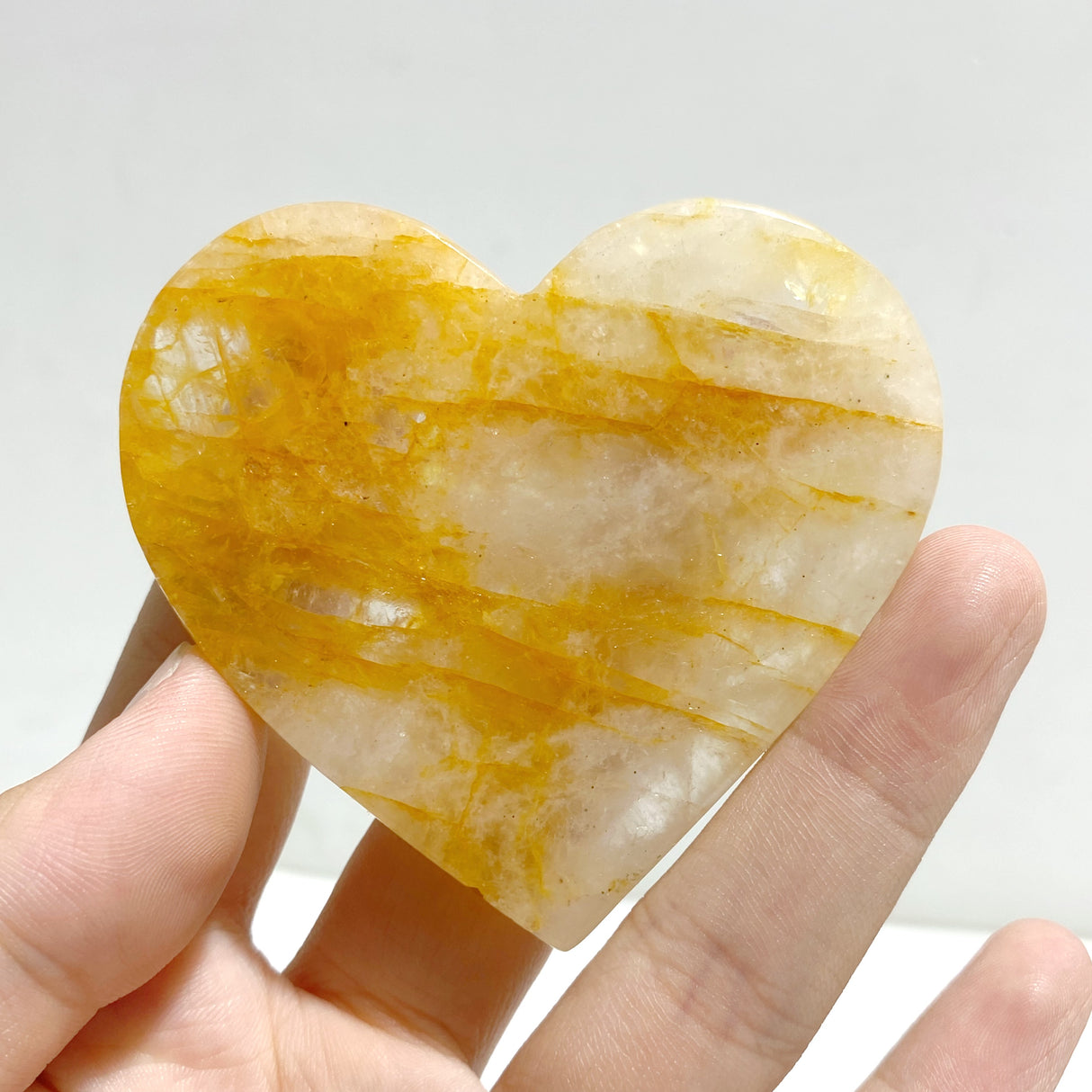 Golden Hematoid Quartz Heart Wing Carving With Stand Fire Quartz