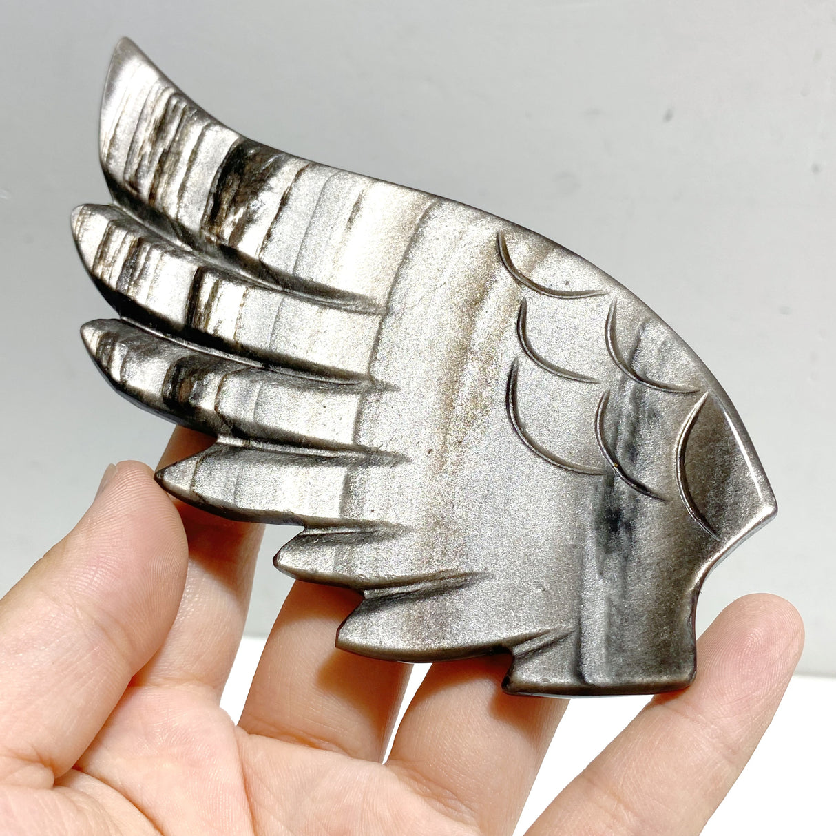 Silver Sheen Obsidian Heart Wing Carving With Stand