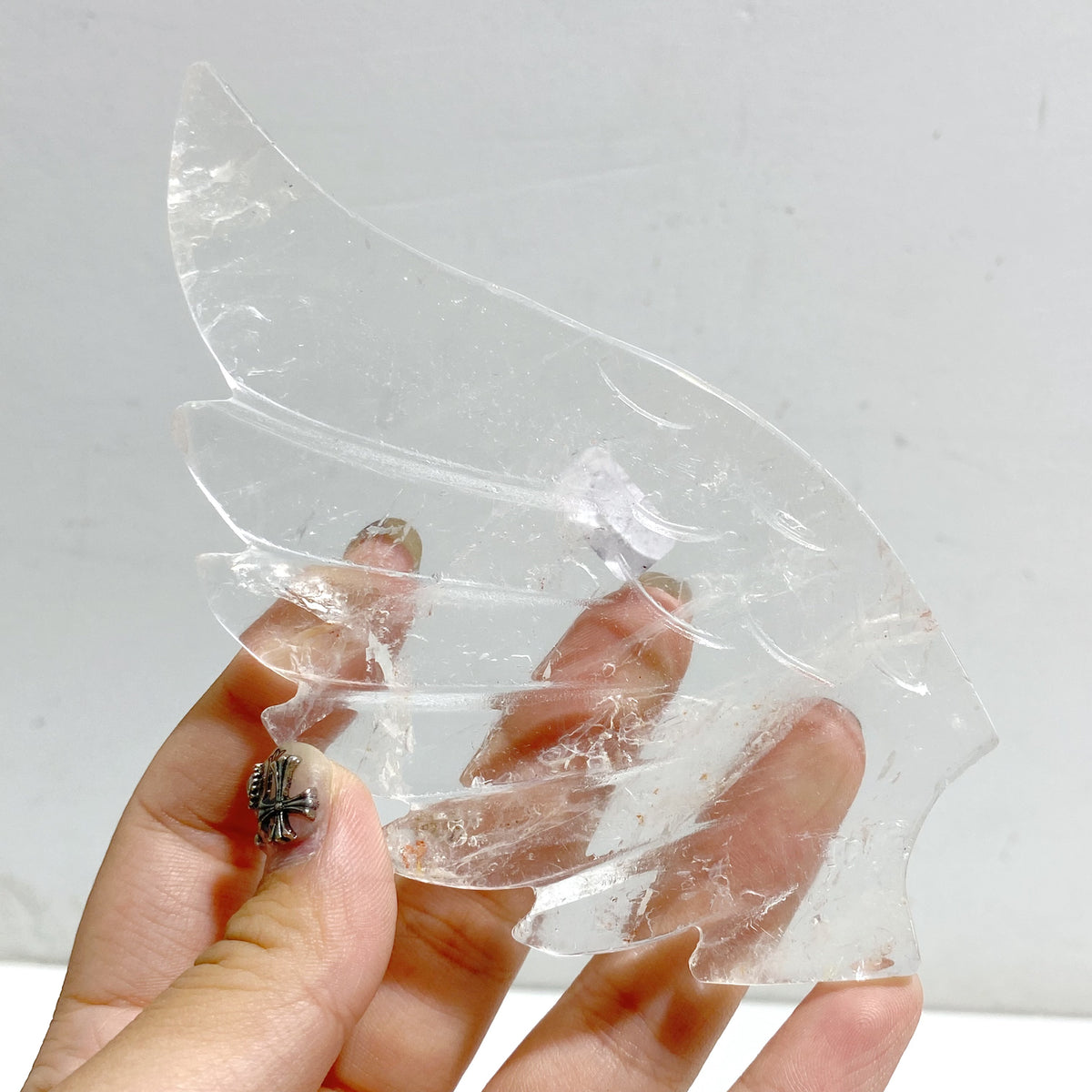 Clear Quartz Heart Wing Carving With Stand