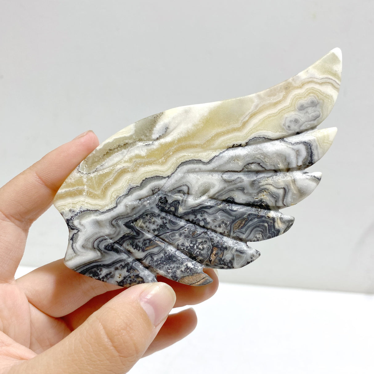 Gray Lace Agate Heart Wing Carving With Stand