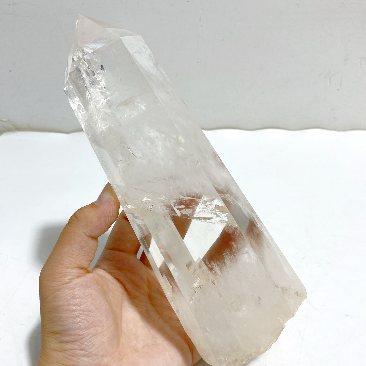 Large Clear Quartz Point Raw Bottom With Stand