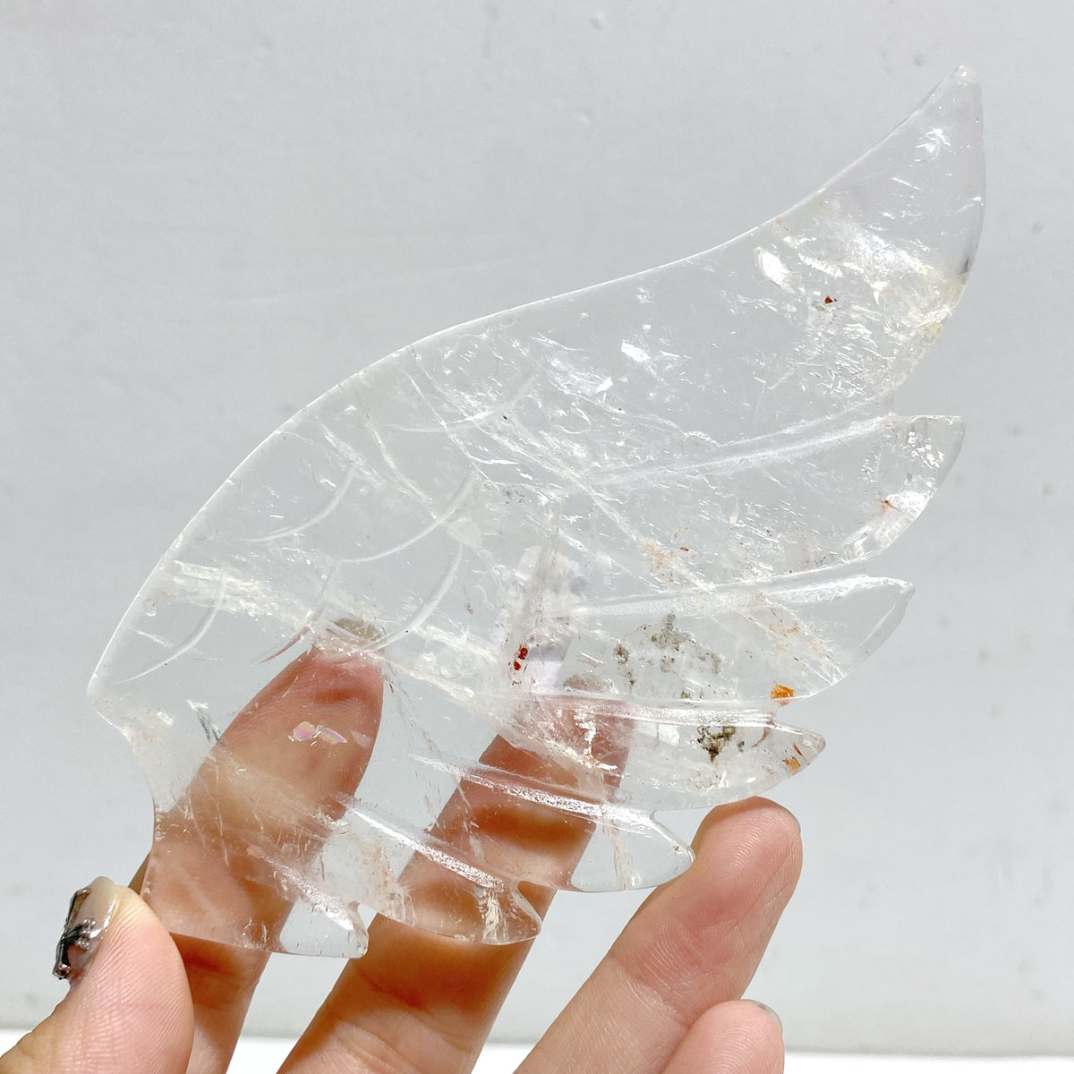 Clear Quartz Heart Wing Carving With Stand