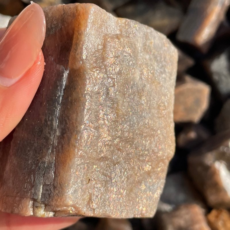 Raw Black Rainbow Sun Stone With Hematite Rough Stone Wholesale - Wholesale Crystals