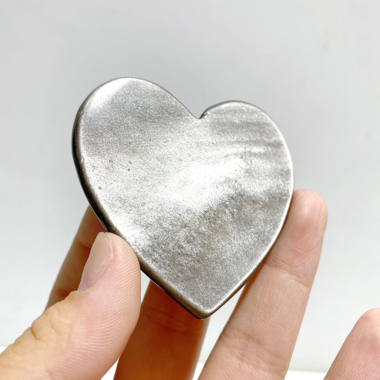 Silver Sheen Obsidian Heart Wing Carving With Stand