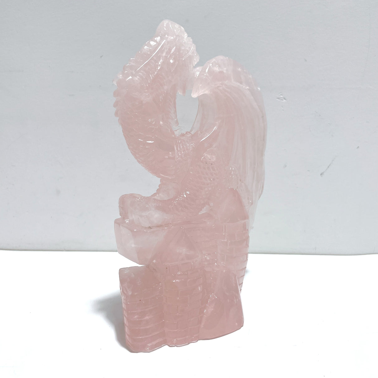 Beautiful Rose Quartz Flying Dragon Castle Carving