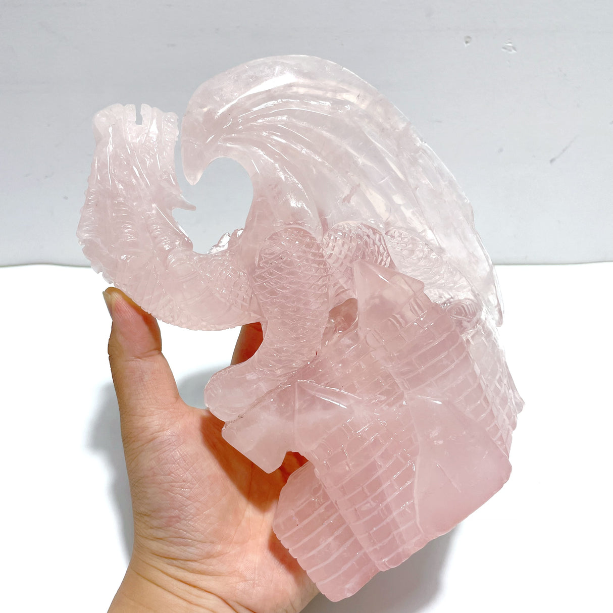 Beautiful Rose Quartz Flying Dragon Castle Carving