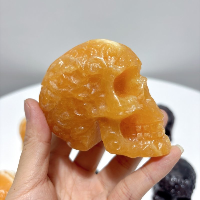 4 Types Crystal Skull Carving Wholesale Orange Calcite Garnet - Wholesale Crystals