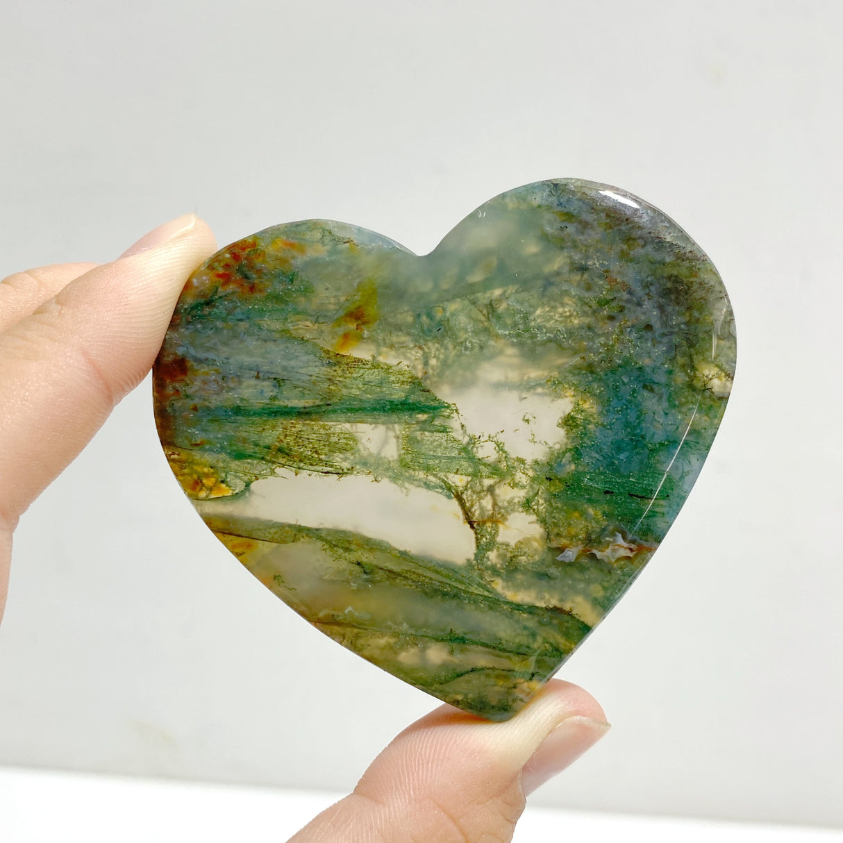 Moss Agate Heart Wing Carving With Stand