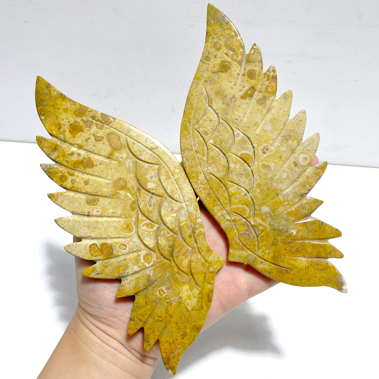Unique Yellow Ocean Jasper Angel Wing Carving With Stand