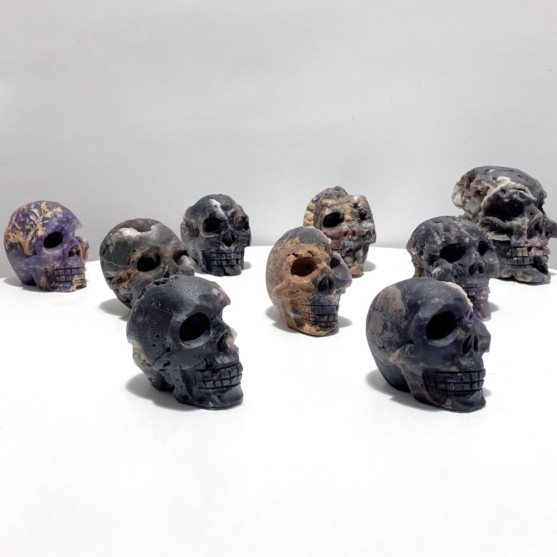 9 Pieces Purple Fluorite Skull Carving - Wholesale Crystals