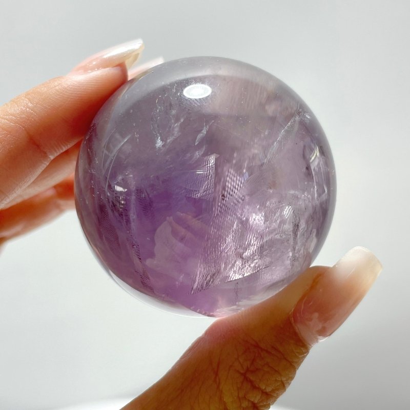 God's Fingerprint Amethyst Light Purple Spheres Wholesale - Wholesale Crystals