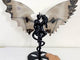 Unique Volcano Agate Demon And Angel Wing Carving With Stand (UV-Reactive)