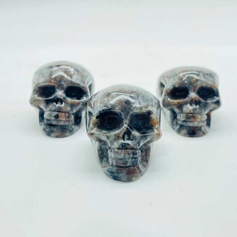 1.7in Skull Carving Wholesale Yooperlite (UV Reactive) Larvikite - Wholesale Crystals