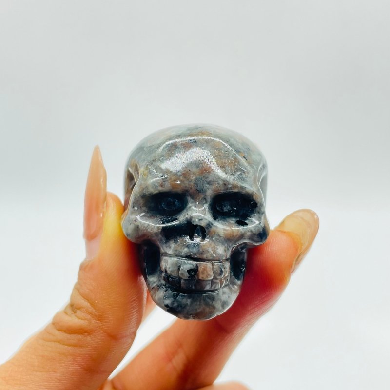 1.7in Skull Carving Wholesale Yooperlite (UV Reactive) Larvikite - Wholesale Crystals